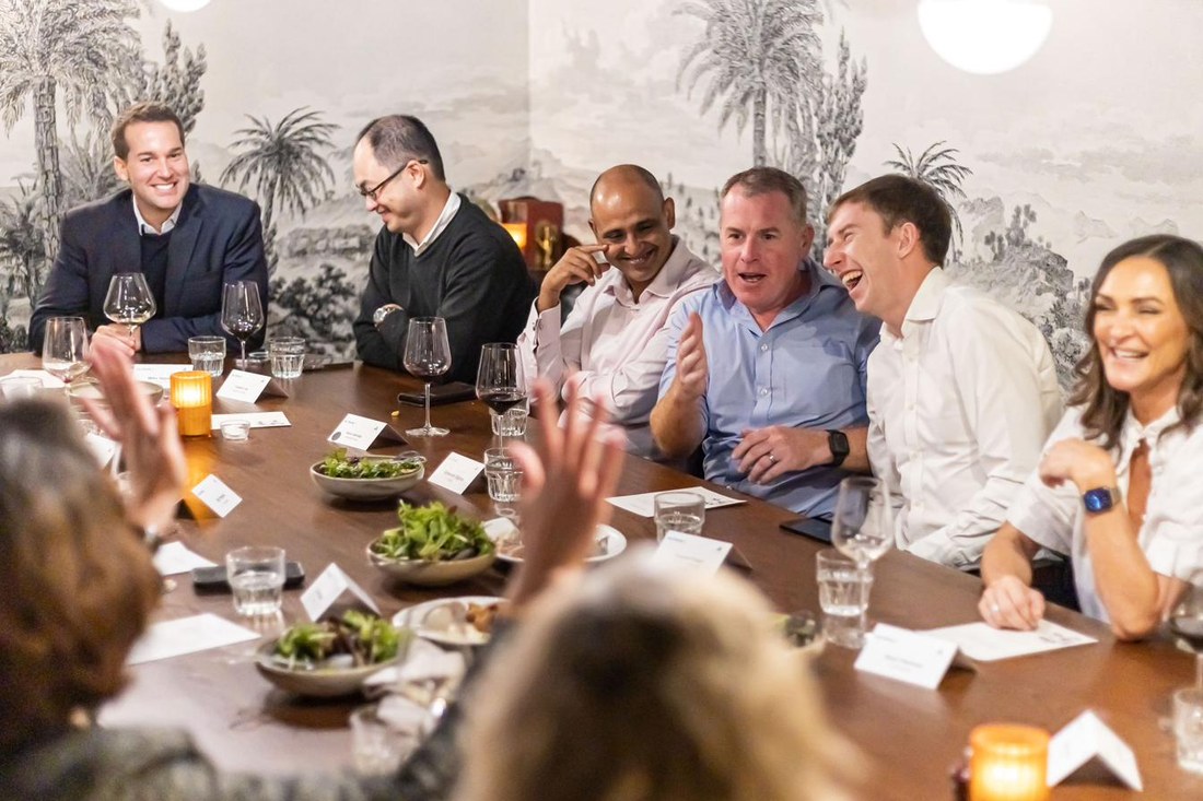 Guests in conversation at an Innovatus Media dinner